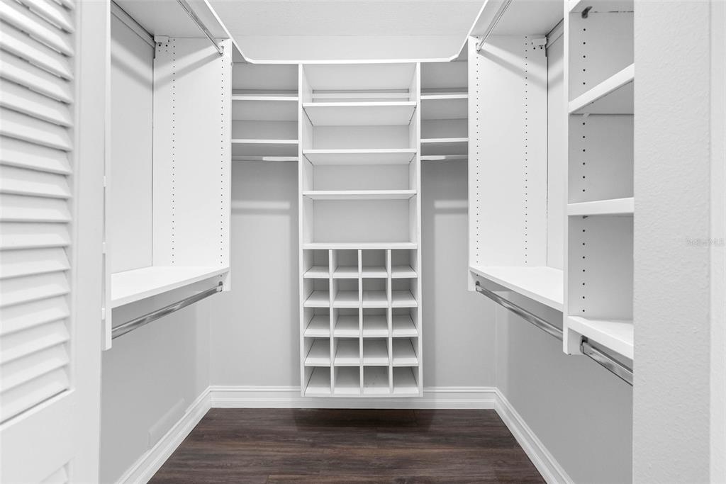 346 Ranch Road Tarpon Springs, FL 34688 - Photo 29 of 64 a view of empty room with wooden floor and windows