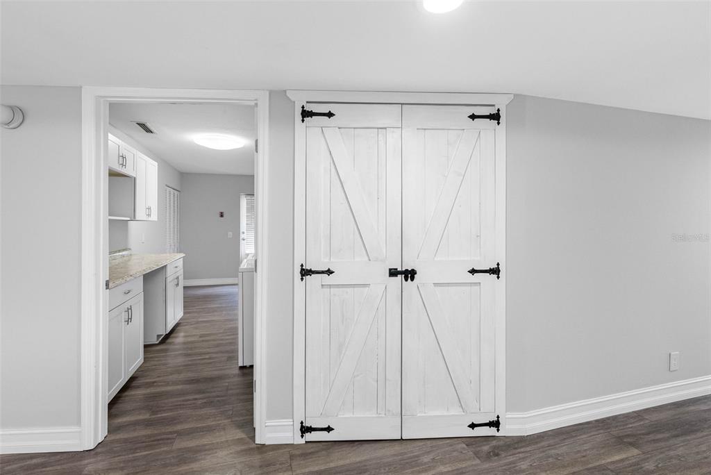 346 Ranch Road Tarpon Springs, FL 34688 - Photo 41 of 64 a view of a bathroom with wooden floor