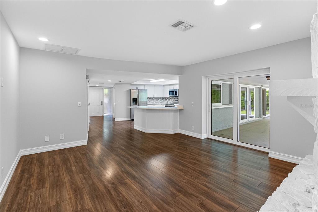346 Ranch Road Tarpon Springs, FL 34688 - Photo 44 of 64 a view of a kitchen with wooden floor and a kitchen
