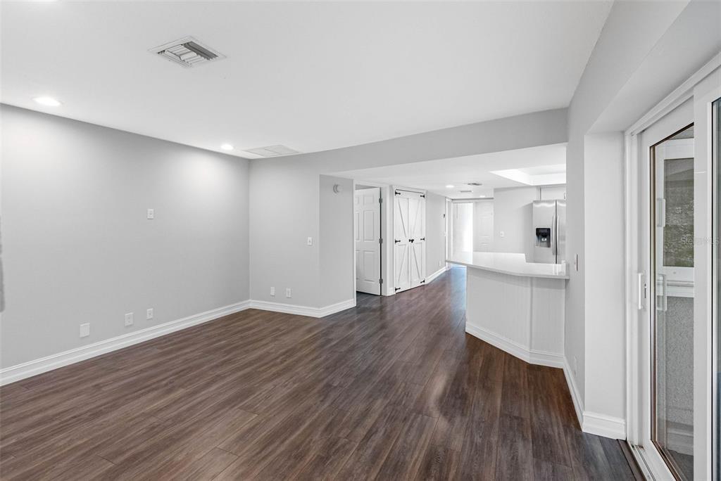 346 Ranch Road Tarpon Springs, FL 34688 - Photo 48 of 64 a view of a room with wooden floor and a window