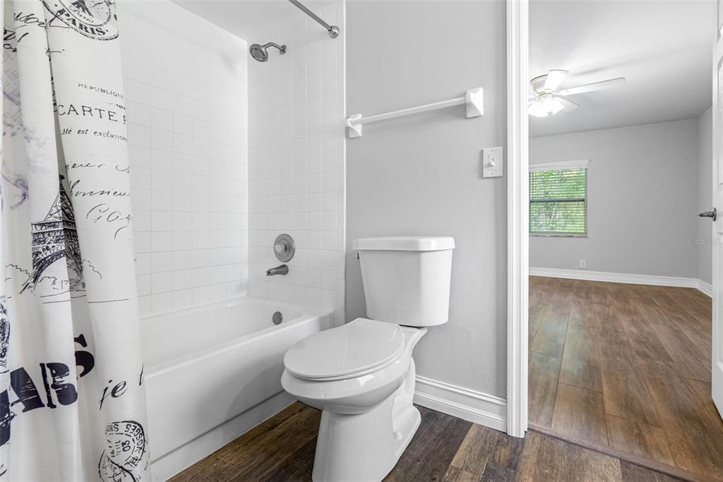 346 Ranch Road Tarpon Springs, FL 34688 - Photo 53 of 64 a bathroom with a toilet and a shower