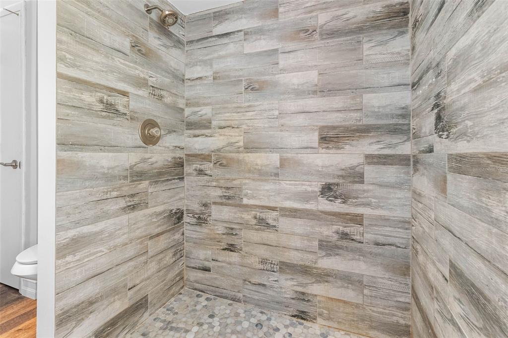 346 Ranch Road Tarpon Springs, FL 34688 - Photo 58 of 64 a bathroom with a shower