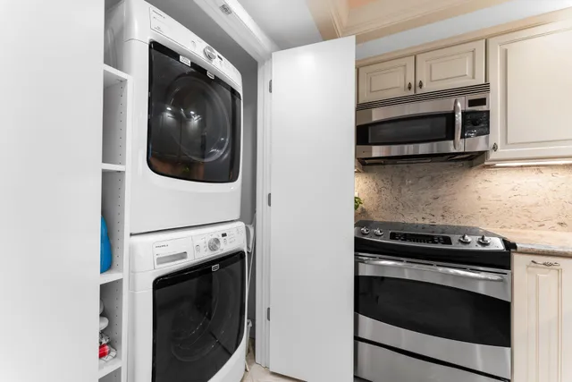 a kitchen with a stove and a microwave