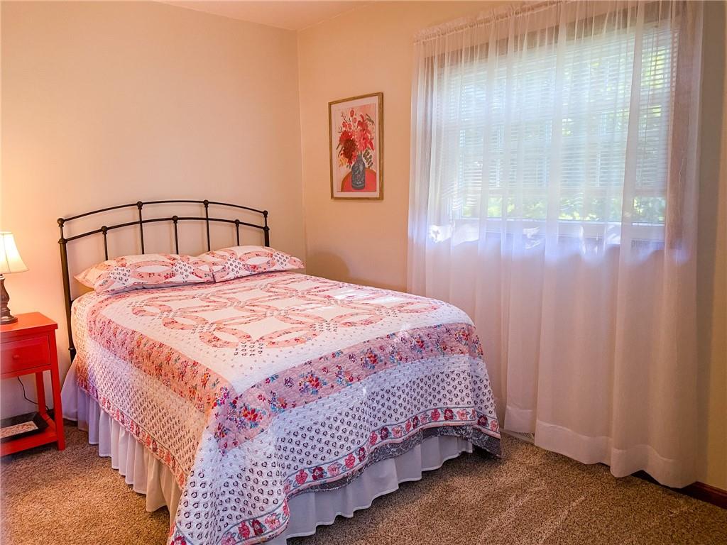 537 Fleming Road Sarver, PA 16055 - Photo 12 of 20 a bedroom with a bed and a painting on the wall