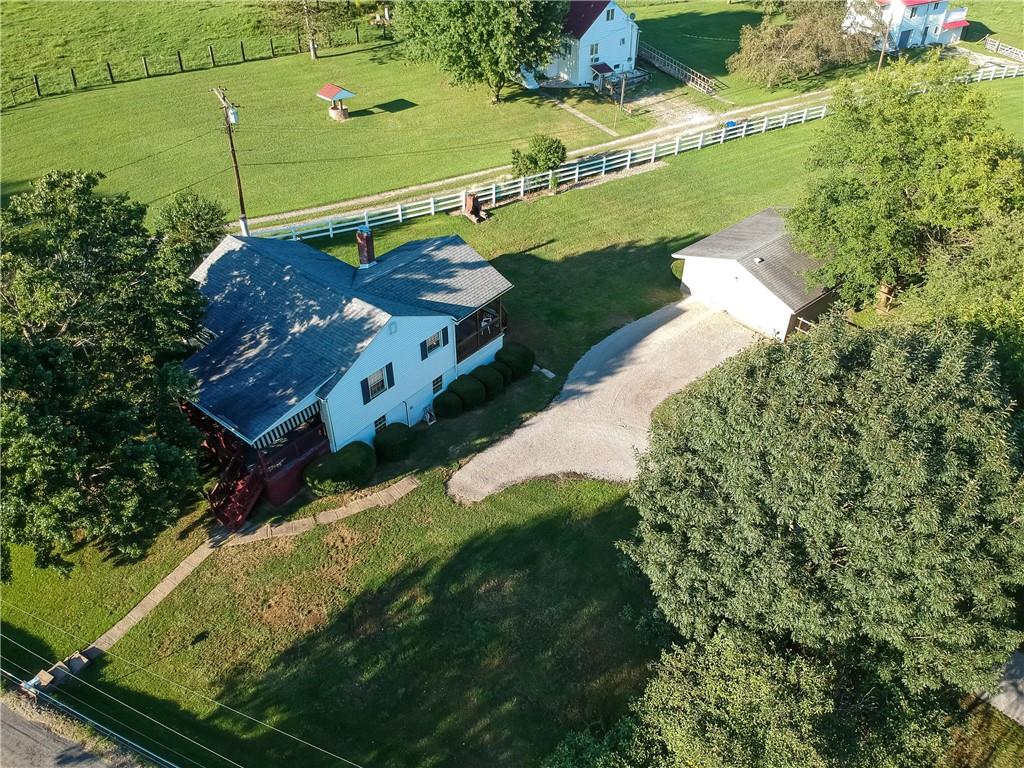 537 Fleming Road Sarver, PA 16055 - Photo 3 of 20 a view of a lake with a house in the background