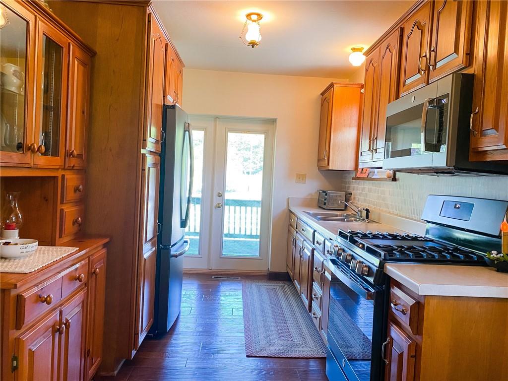 537 Fleming Road Sarver, PA 16055 - Photo 8 of 20 a kitchen that has a lot of cabinets in it