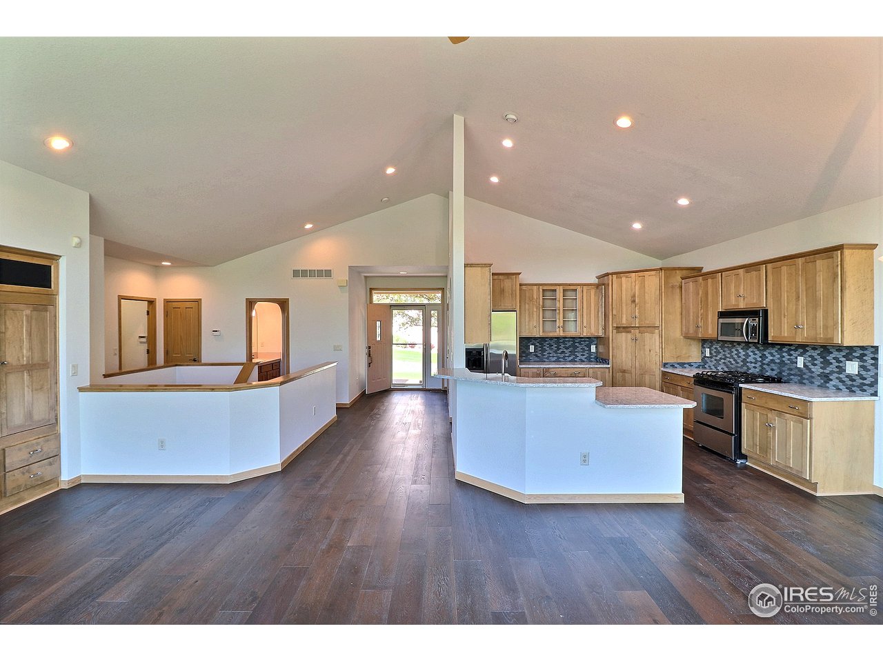 7205 Poudre River Road, Unit 3 Greeley, CO 80634 - Photo 3 of 27 Open Kitchen with Granite bar