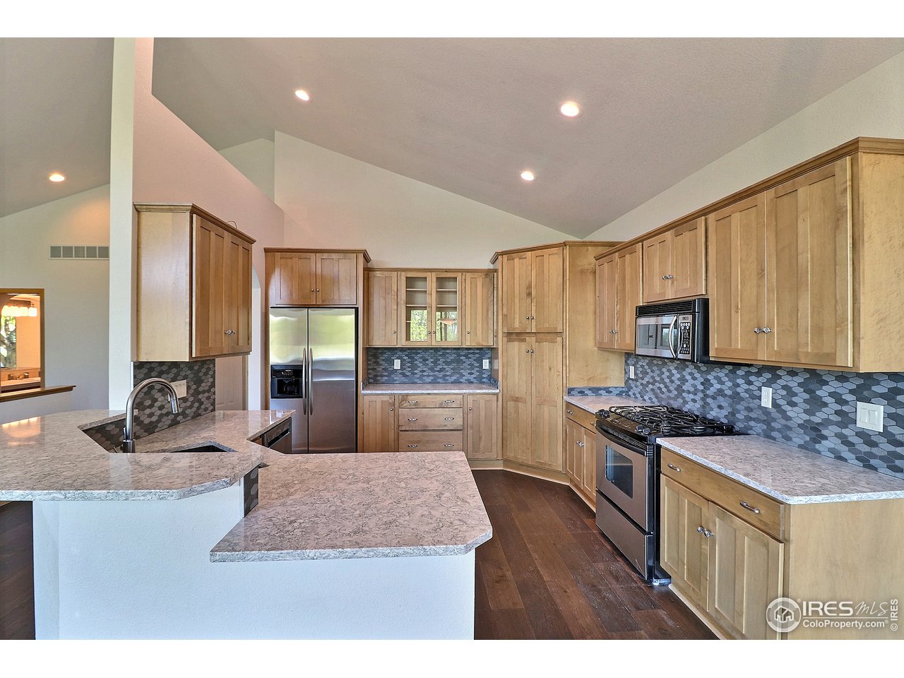 7205 Poudre River Road, Unit 3 Greeley, CO 80634 - Photo 9 of 27 Schroll cabinetry throughout