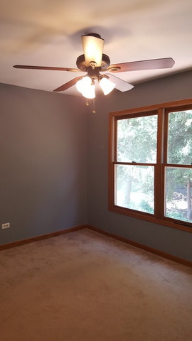 1102 Gulf Keys Road Streamwood, IL 60120 - Photo 19 of 25 a view of an empty room with a window