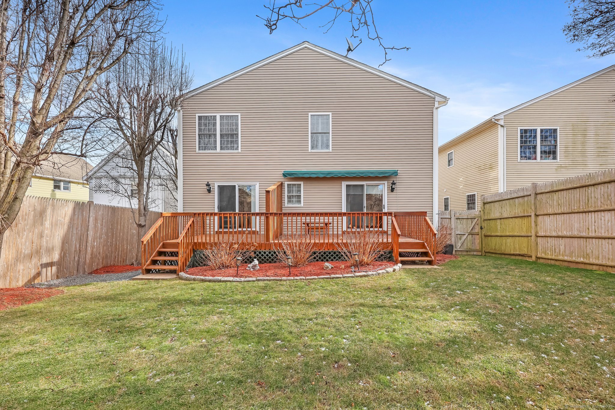 105 Dean Street, Unit A Stamford, CT 06902 - Photo 13 of 16 a view of a house with backyard