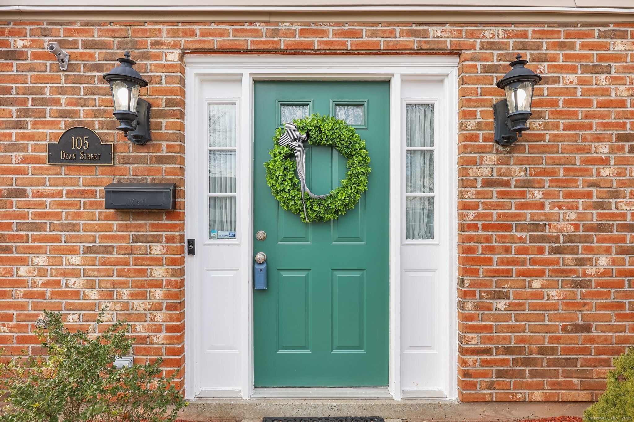 105 Dean Street, Unit A Stamford, CT 06902 - Photo 2 of 16 a front view of a brick building