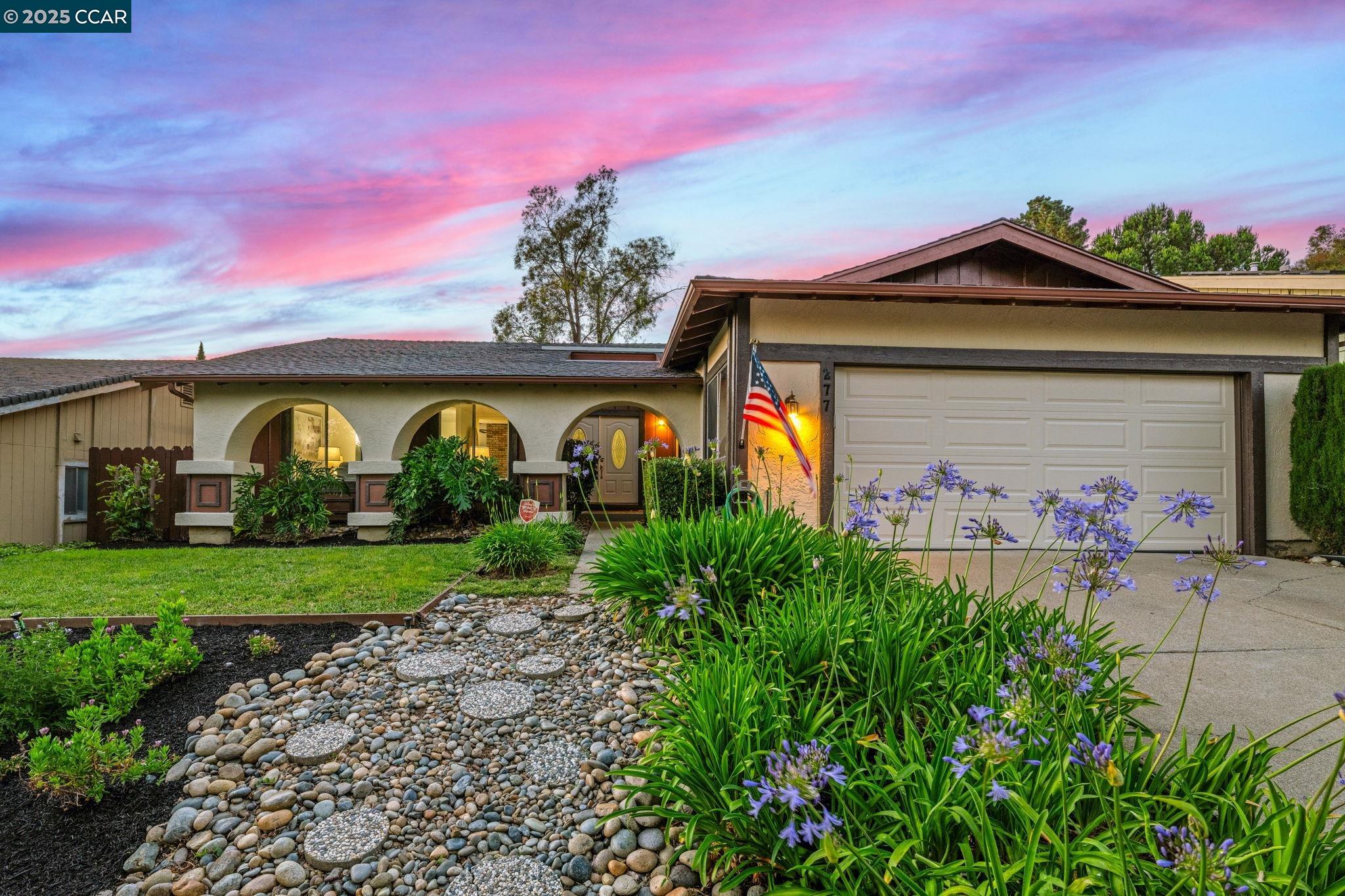 277 Holiday Hills Drive Martinez, CA 94553 - Photo 1 of 1 a front view of a house with garden