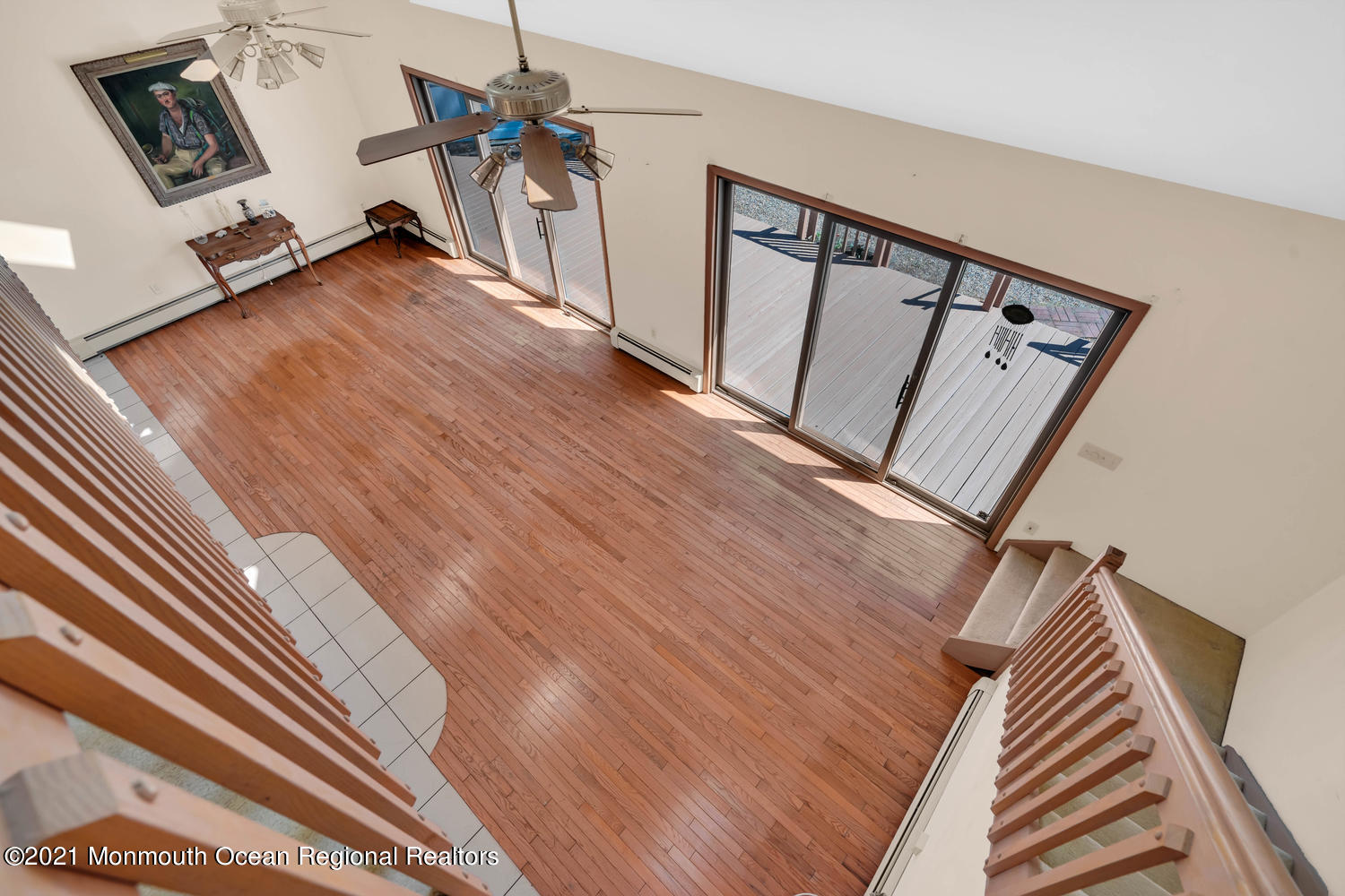 19 North Island Road Bayville, NJ 08721 - Photo 26 of 54 a view of a hallway with workspace and wooden floor