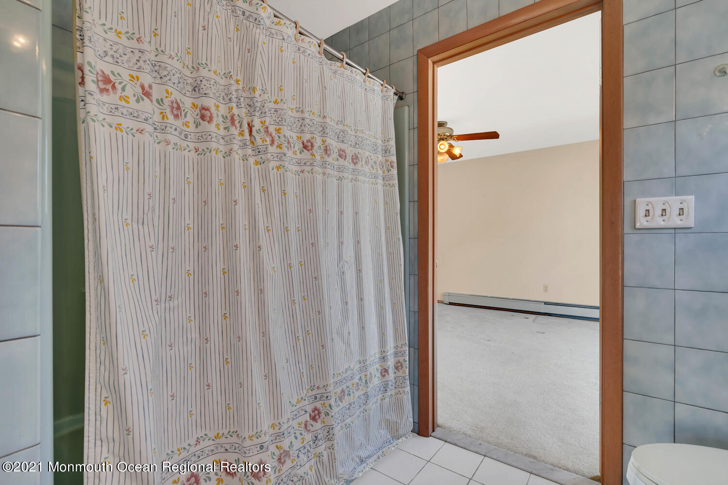 19 North Island Road Bayville, NJ 08721 - Photo 31 of 54 a view of a bathroom with a shower curtain
