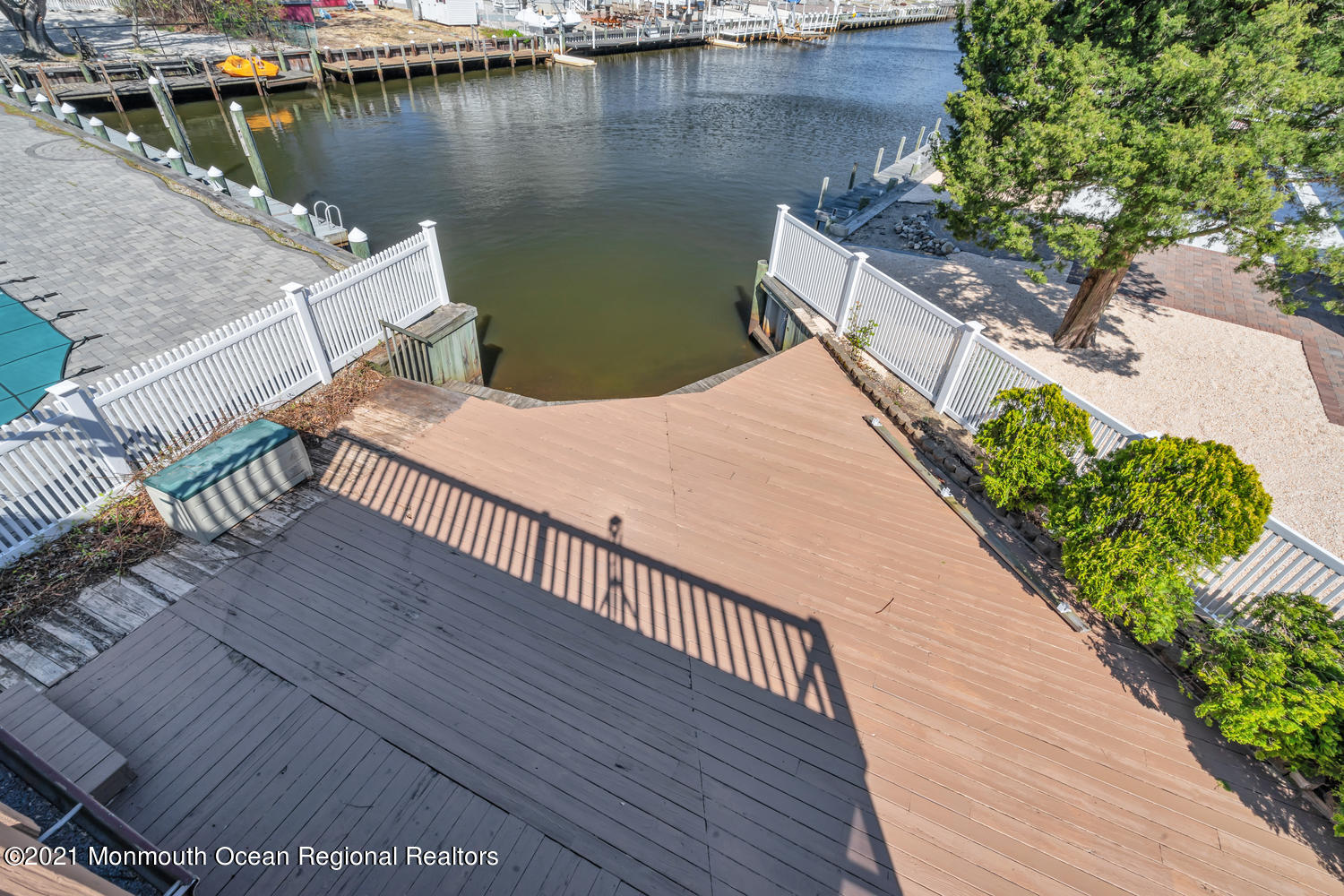 19 North Island Road Bayville, NJ 08721 - Photo 35 of 54 a balcony with wooden floor and fence