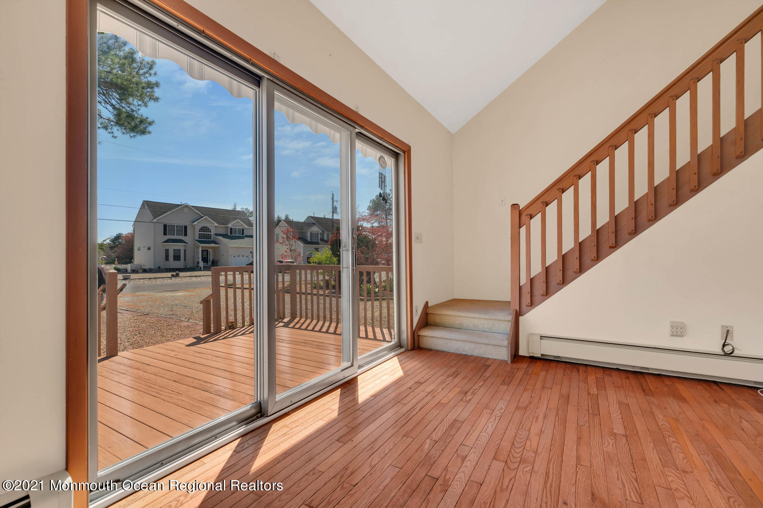 19 North Island Road Bayville, NJ 08721 - Photo 38 of 54 a view of front door and porch with wooden floor