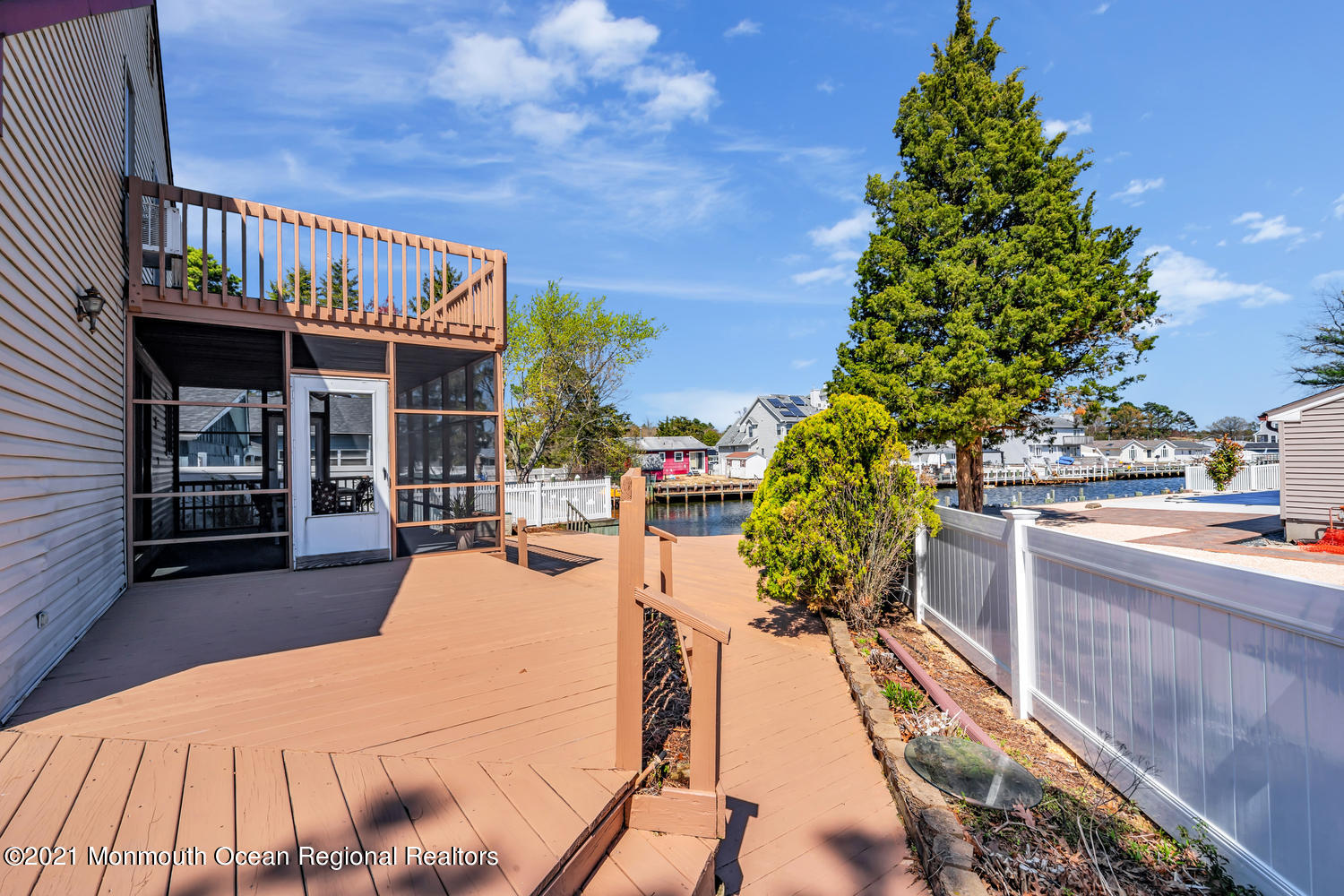 19 North Island Road Bayville, NJ 08721 - Photo 39 of 54 a view of a swimming pool with a patio