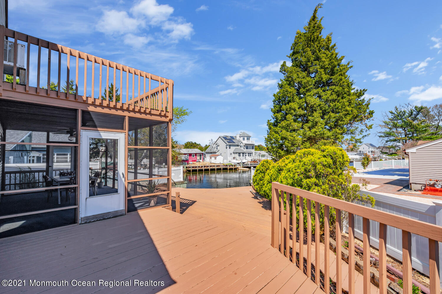 19 North Island Road Bayville, NJ 08721 - Photo 40 of 54 a balcony with table and chairs