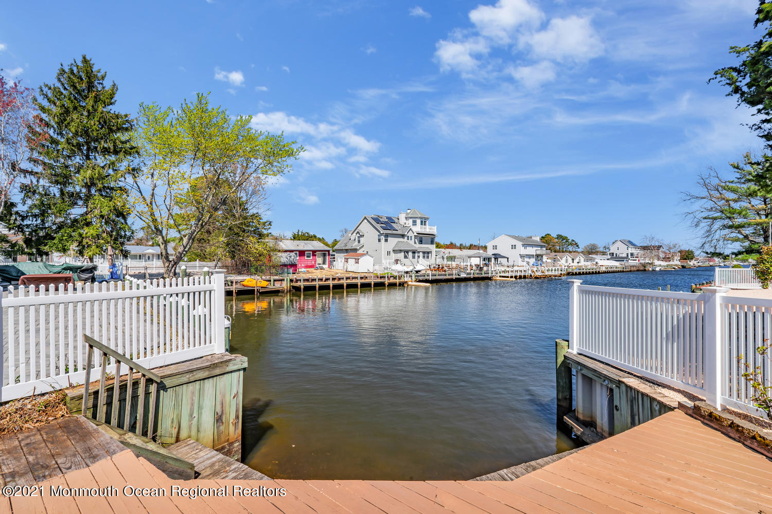 19 North Island Road Bayville, NJ 08721 - Photo 44 of 54 a view of a balcony with wooden chairs