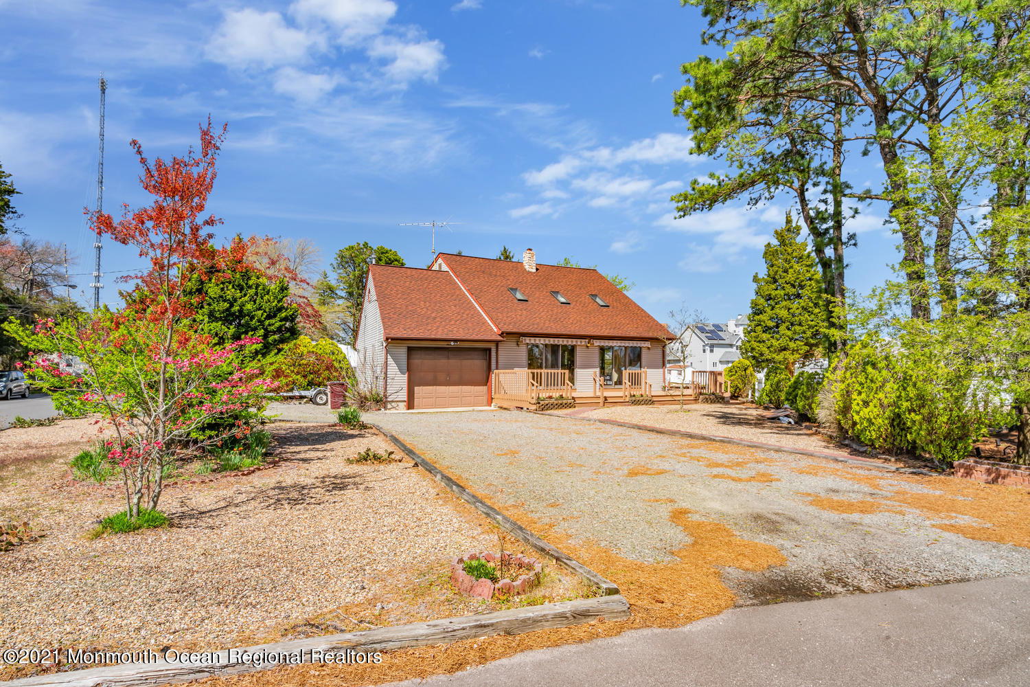 19 North Island Road Bayville, NJ 08721 - Photo 52 of 54 a front view of a house with a yard