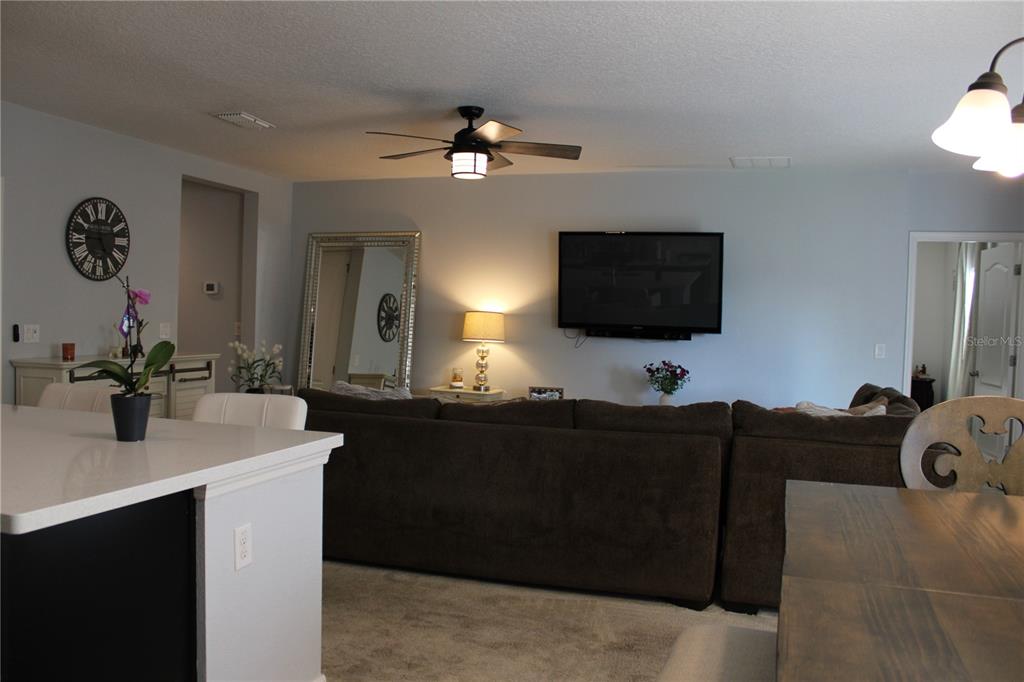 2591 Wadeview Loop St. Cloud, FL 34769 - Photo 6 of 18 a bathroom with a sink and a mirror