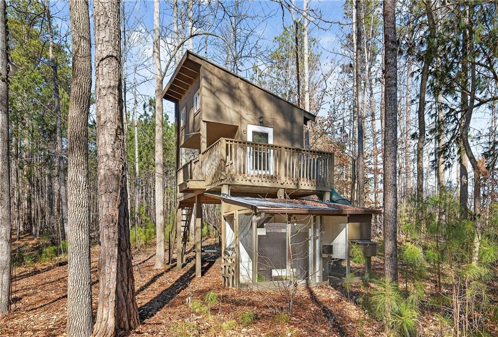 340 Scott Farm Drive Powder Springs, GA 30127 - Photo 53 of 59 a view of a house with large trees