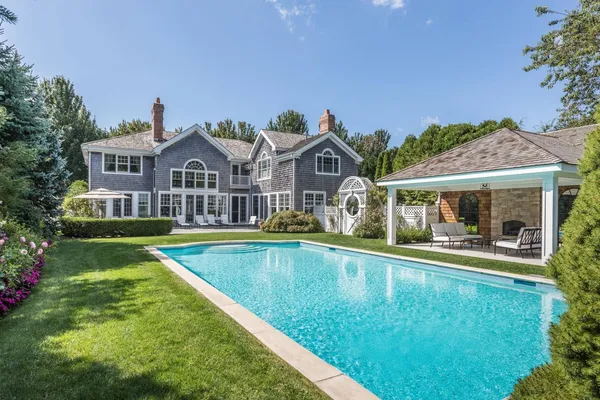 a view of a house with a swimming pool