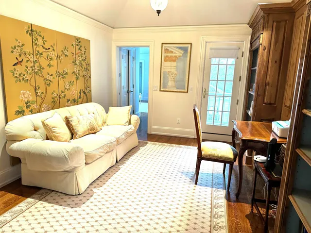 a living room with furniture and a couch