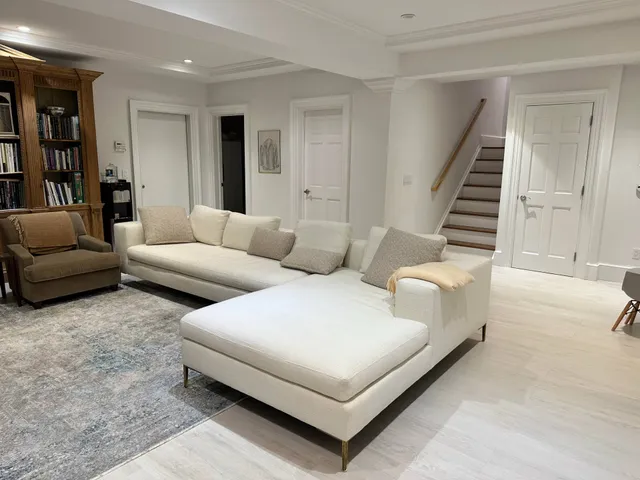 a living room with furniture and a couch