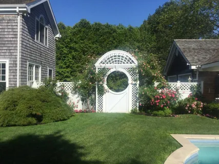 a house with a yard and a garden
