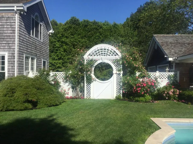 a house with a yard and a garden