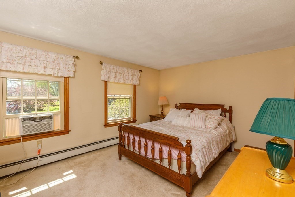 202 Leo Drive Gardner, MA 01440 - Photo 16 of 26 a bedroom with a bed and window