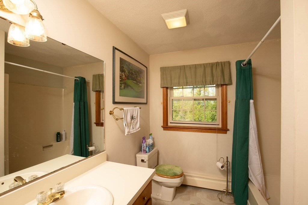 202 Leo Drive Gardner, MA 01440 - Photo 17 of 26 a bedroom with a bed and a window