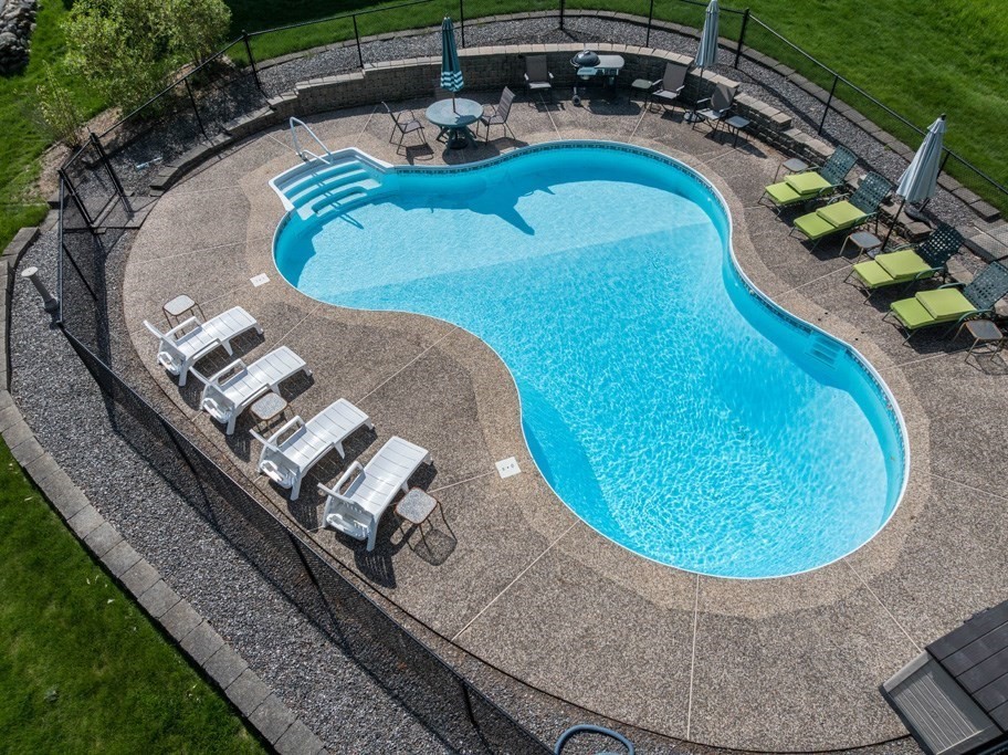 202 Leo Drive Gardner, MA 01440 - Photo 20 of 26 a view of a swimming pool with outdoor seating