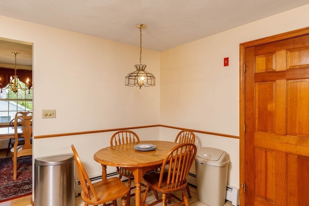 202 Leo Drive Gardner, MA 01440 - Photo 6 of 26 a view of a dining room that has a table and chairs