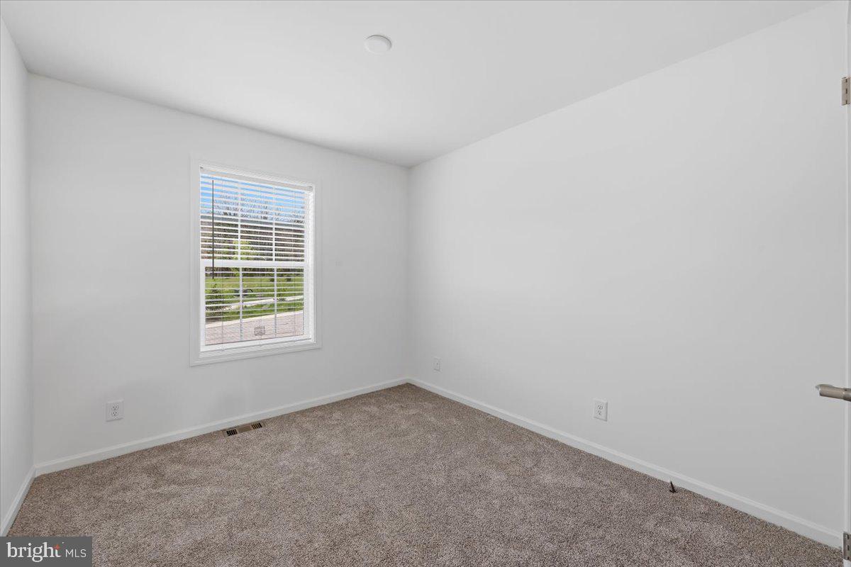 3987 Hastings Road Walnutport, PA 18088 - Photo 17 of 40 an empty room with a window