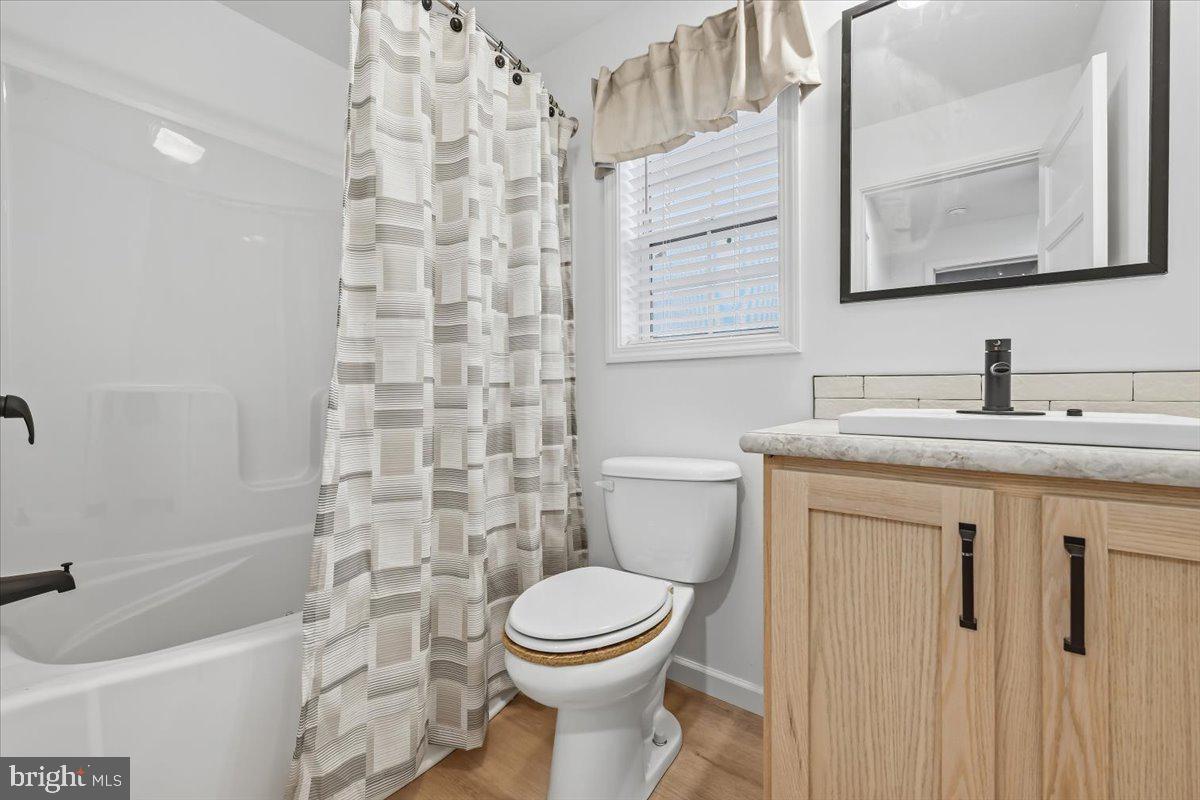 3987 Hastings Road Walnutport, PA 18088 - Photo 20 of 40 a bathroom with a sink toilet and shower