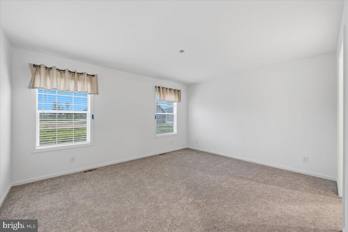3987 Hastings Road Walnutport, PA 18088 - Photo 23 of 40 an empty room with windows