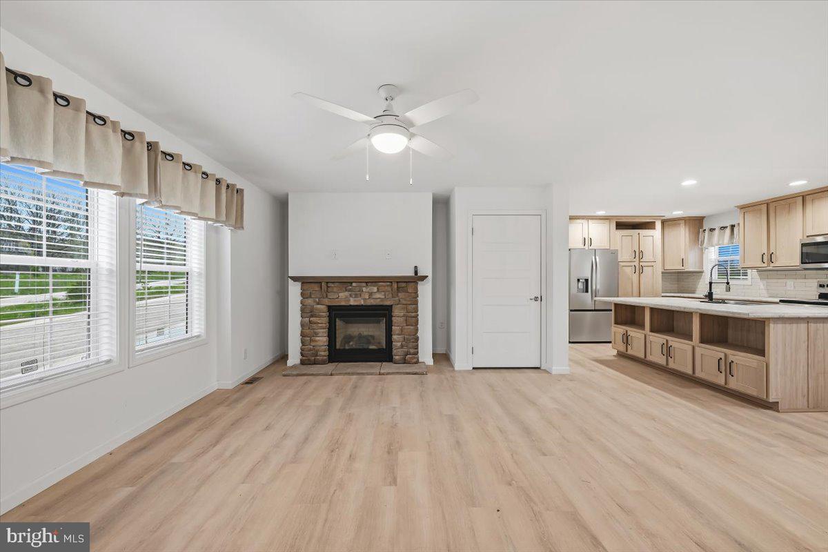 3987 Hastings Road Walnutport, PA 18088 - Photo 6 of 40 a view of an empty room with a window and fireplace