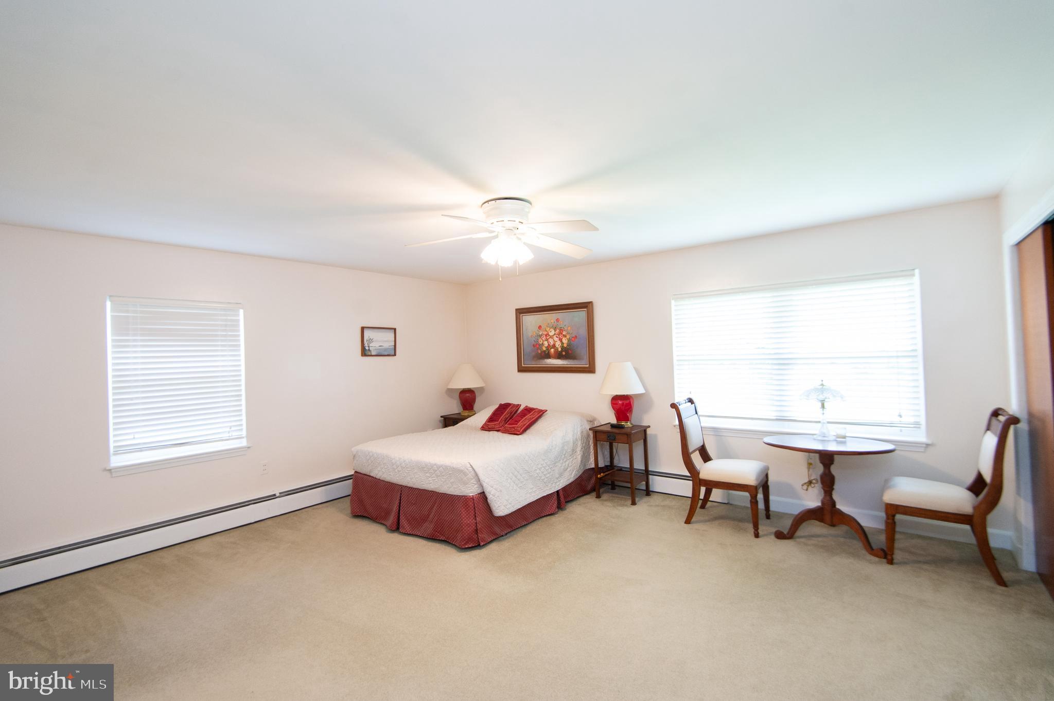 36 Algonquin Road Cambridge, MD 21613 - Photo 23 of 40 a living room with furniture and a window