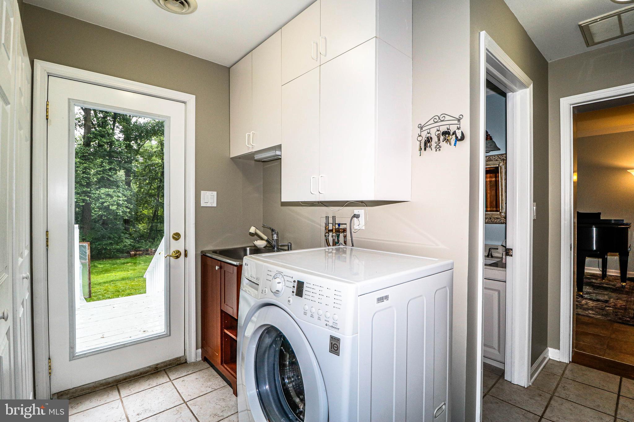131 Mountain Road Ringoes, NJ 08551 - Photo 20 of 47 Laundry Room with Cabinets and ceramic tile floors