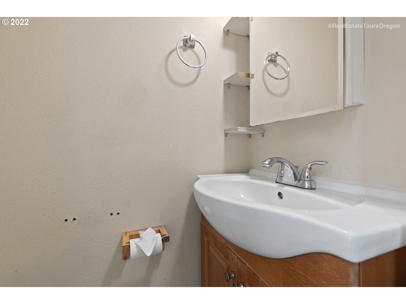 39665 Southwest Gibson Road Gaston, OR 97119 - Photo 12 of 29 a bathroom with a sink and a mirror