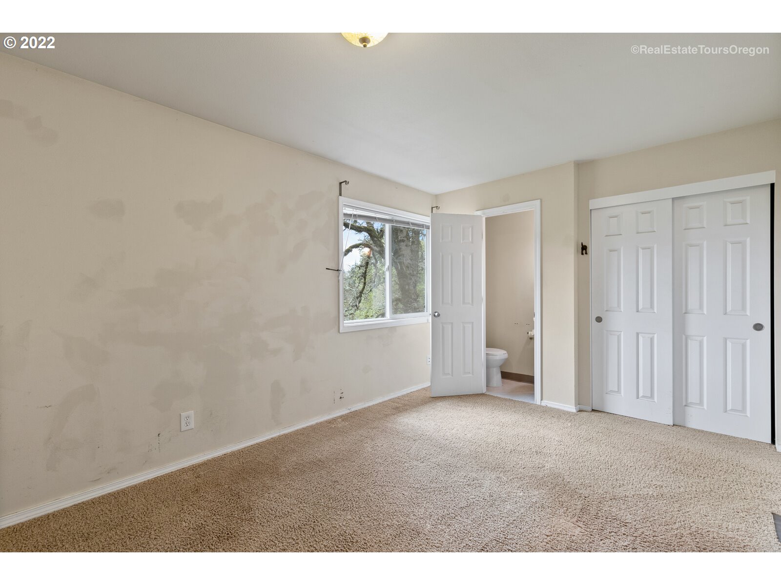39665 Southwest Gibson Road Gaston, OR 97119 - Photo 10 of 29 a view of an empty room with a window