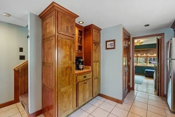 a bathroom with a shower and a sink