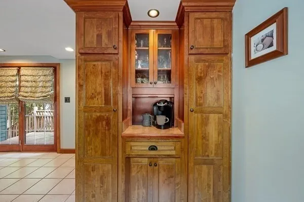 a bathroom with a sink a mirror and shower