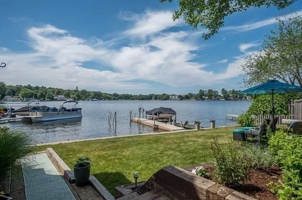 a view of a swimming pool with a lake view