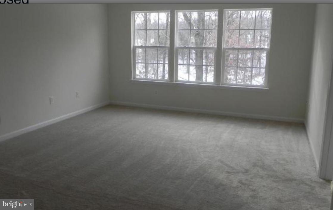 20118 Gunners Terrace Germantown, MD 20876 - Photo 10 of 12 an empty room with a window