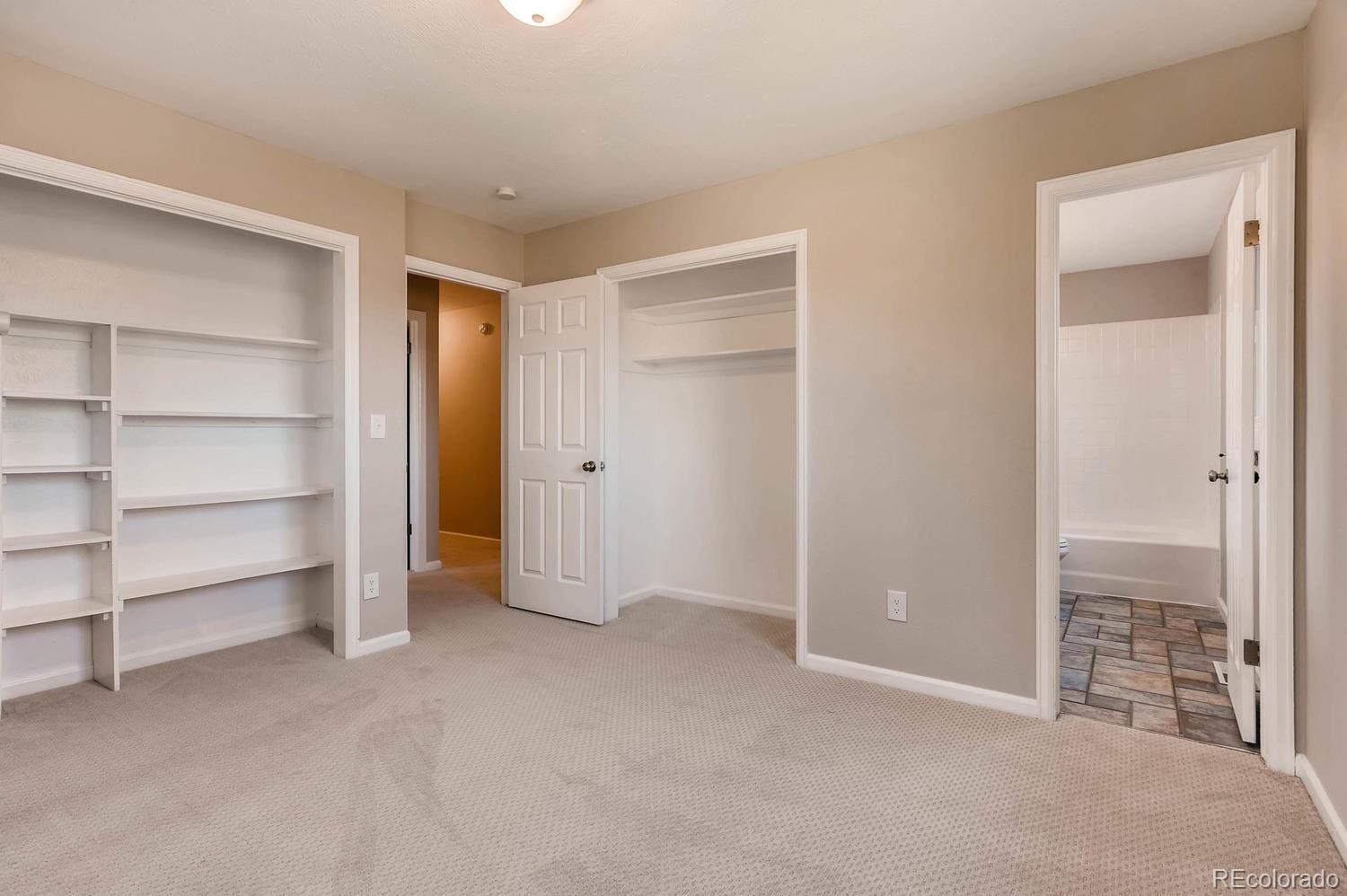 9907 Phillips Road Lafayette, CO 80026 - Photo 27 of 31 a view of an empty room with a closet