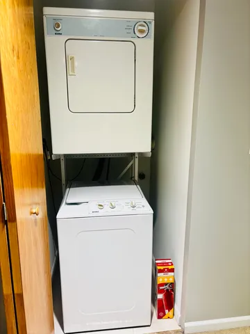 a view of a livingroom with furniture and a rug