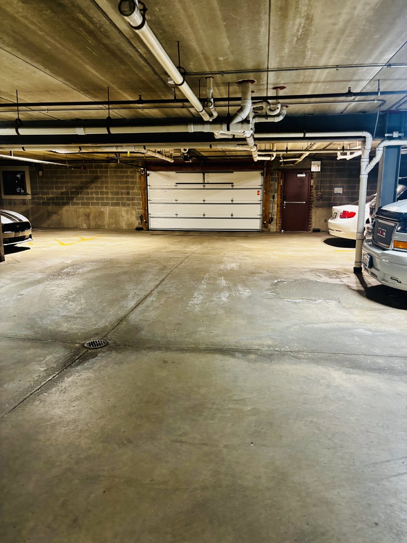 6238 West 26th Street, Unit 201 Berwyn, IL 60402 - Photo 30 of 30 a view of parking garage with cars